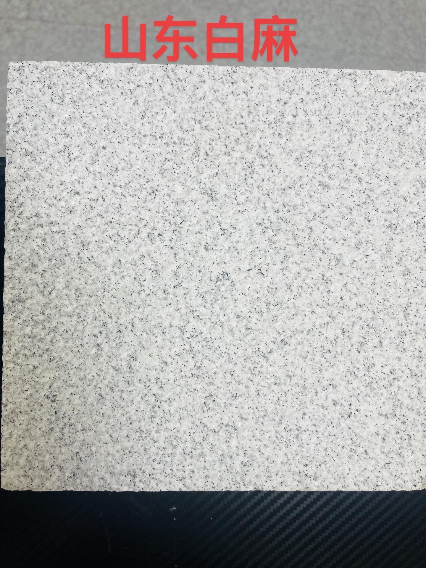 白麻路沿石與火燒石價格對比分析