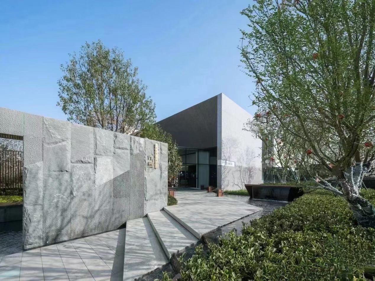 室內室外背景墻用花崗巖好還是PU石好